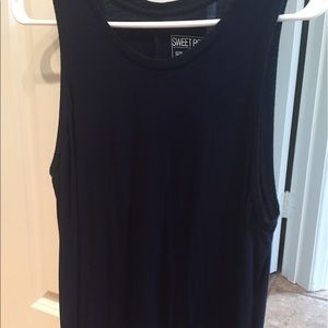 Navy blue tank top with 3inch slit in back.