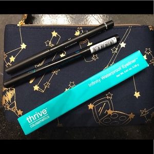 3 eyeliners and makeup bag
