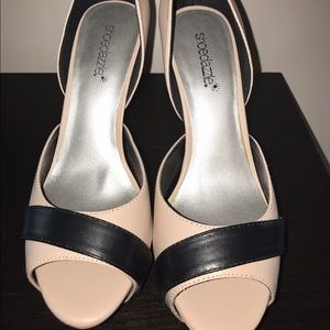 Gently worn peep toe heels.