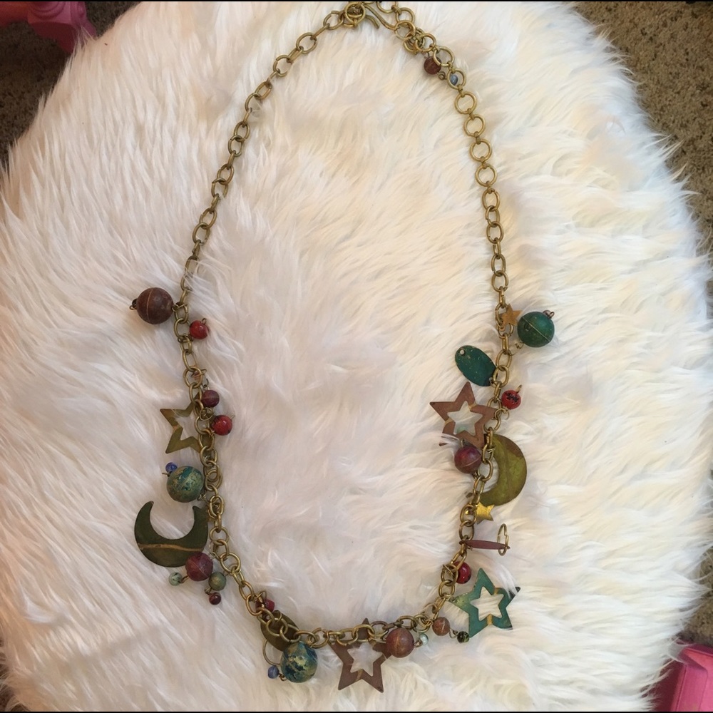 Gold multi metal stars & moons statement necklace