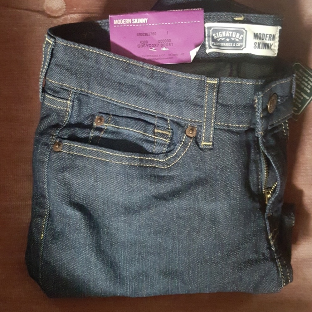 Levi jeans dark wash modern skinny mid rise