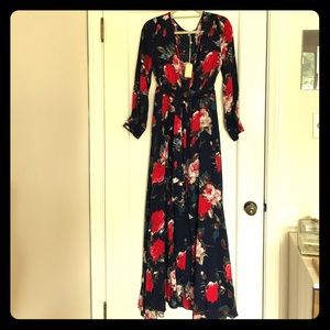 Floral maxi dress. Long sleeves with tie waist.