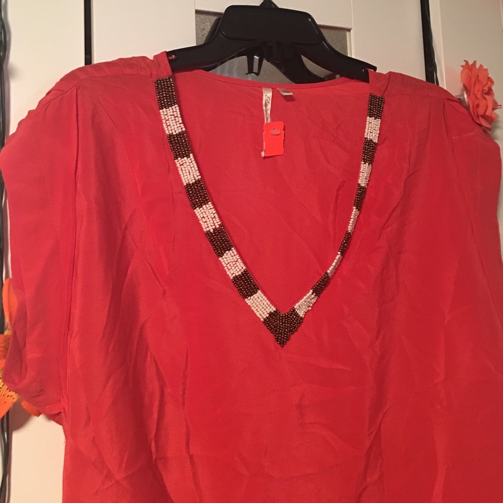 Orange Top With Beaded Details