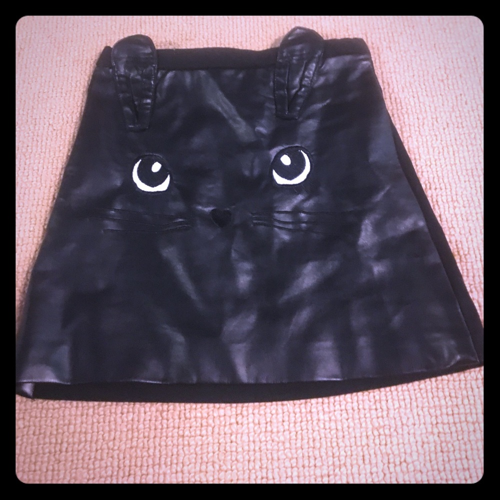 Black pencil skirt with cat face