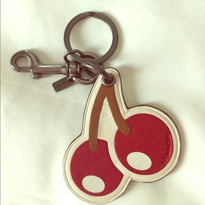 Coach cherry keychain.