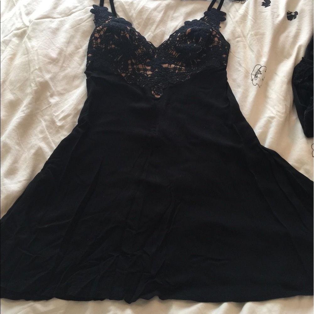 Ritmo de Perla black mini dress