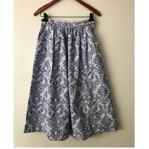 Pleated H&M midi-skirt with floral pattern