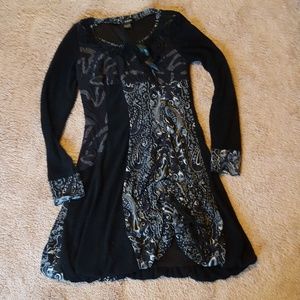 Stunning sweater dress with feathers