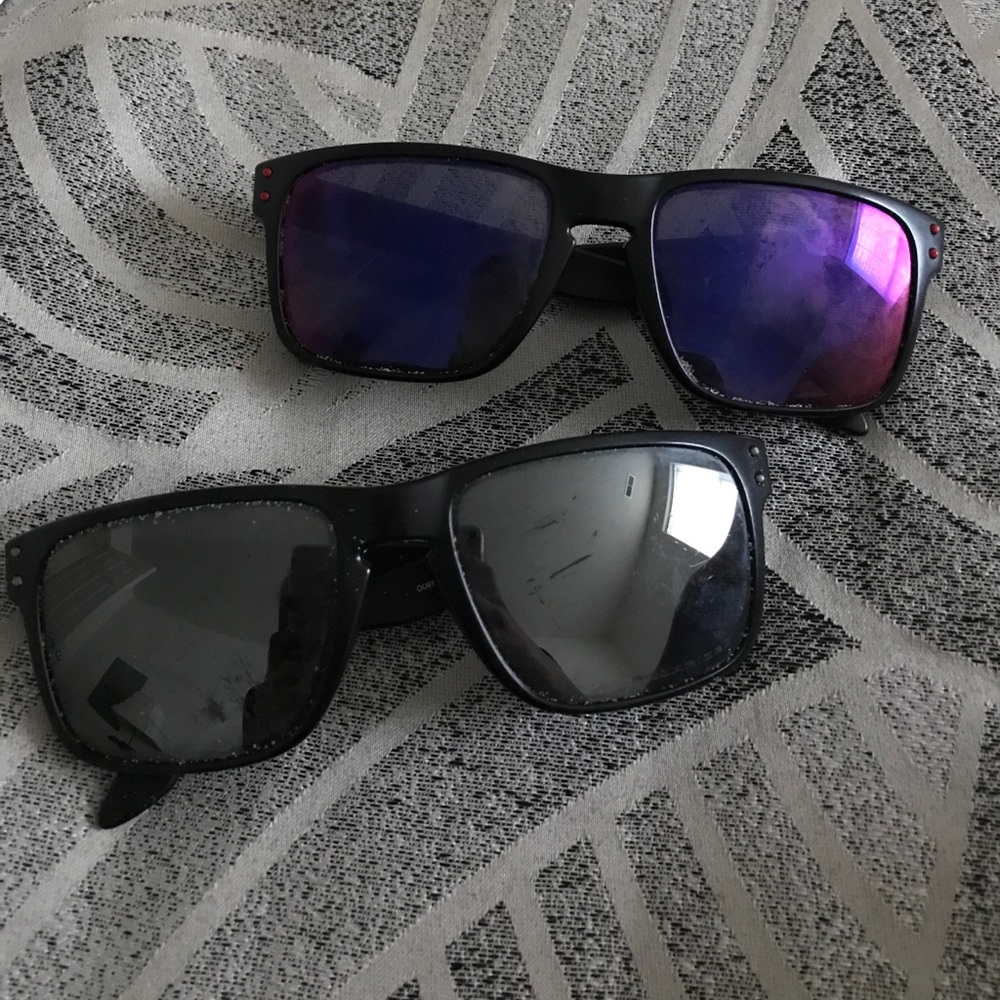 2 pairs of. Oakley's sunglasses