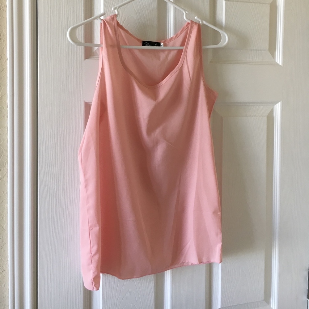 Pink sleeveless blouse