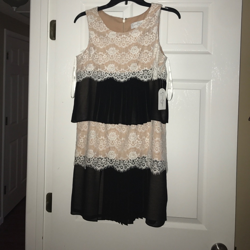 Never wore! Brand new with tags! Paid full price