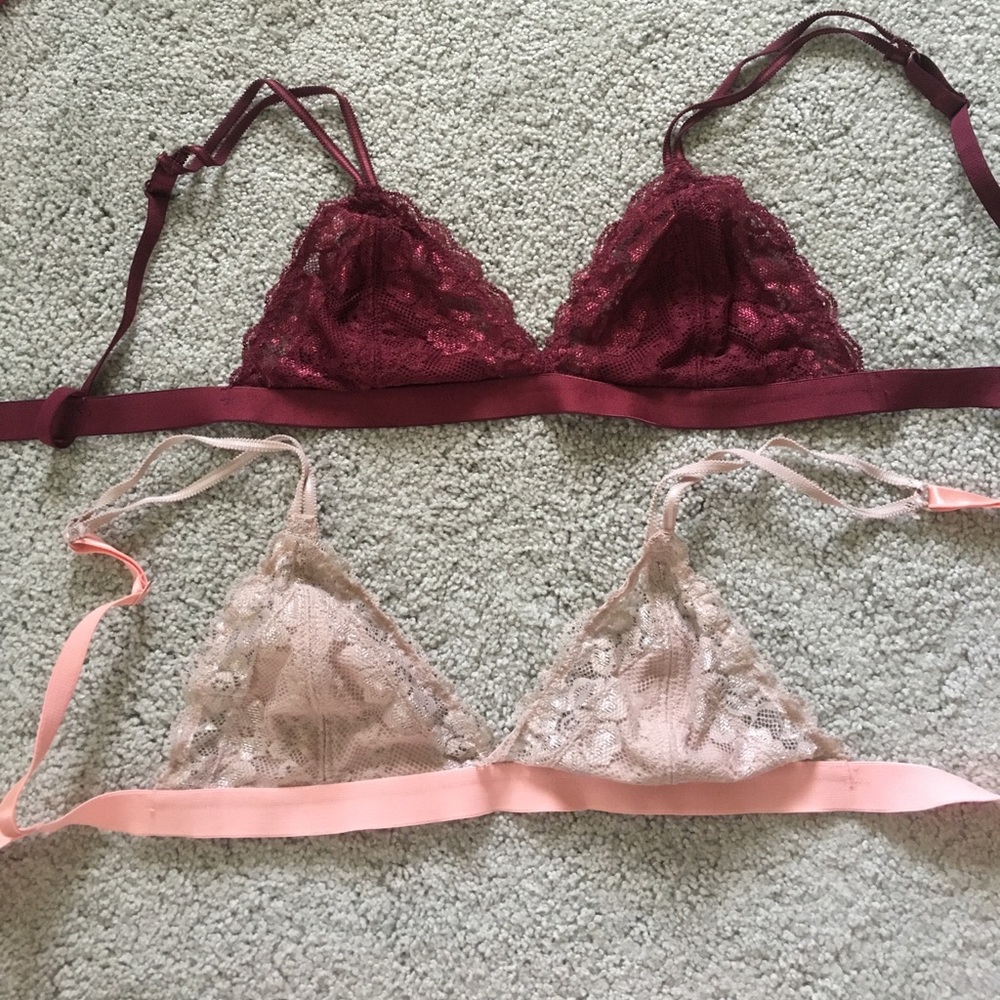 Maroon and nude lace bralettes.