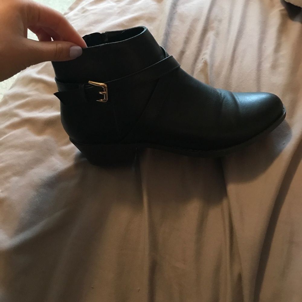 Black leather booties.