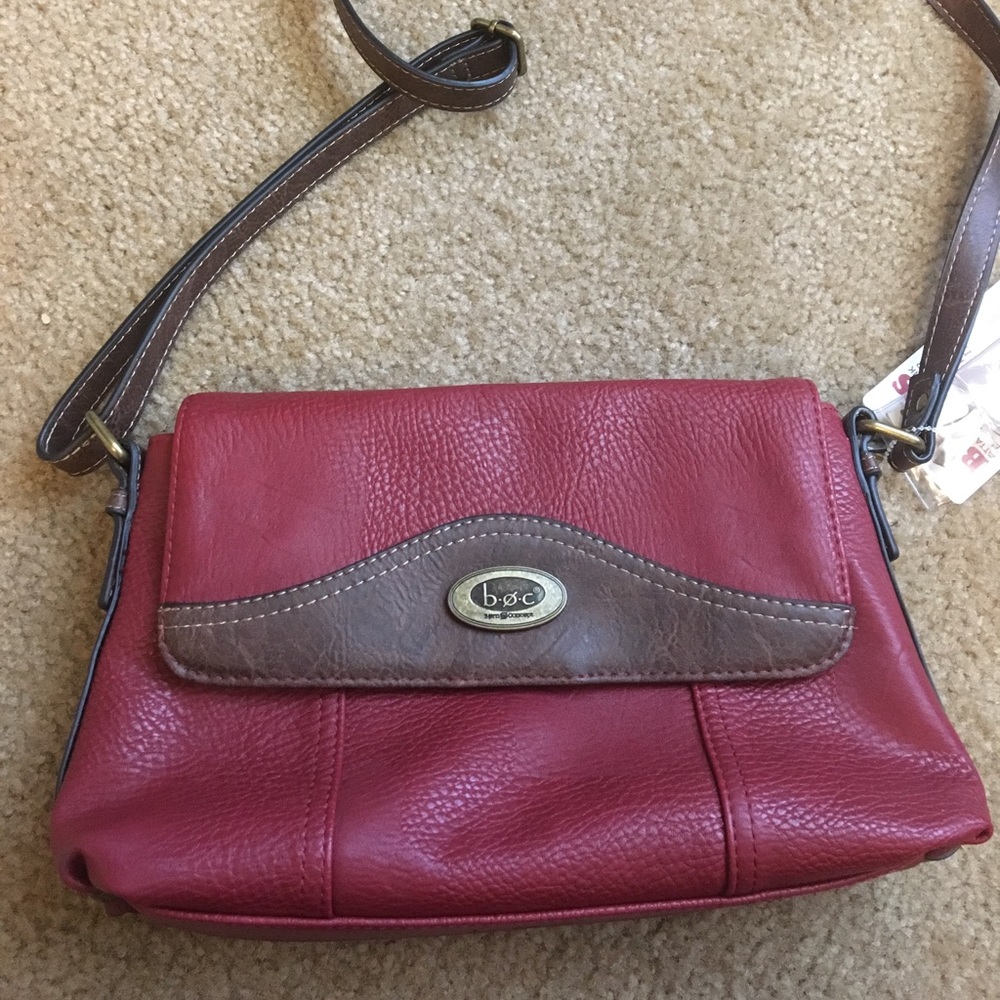 B.o.c purse with portable cell phone charger