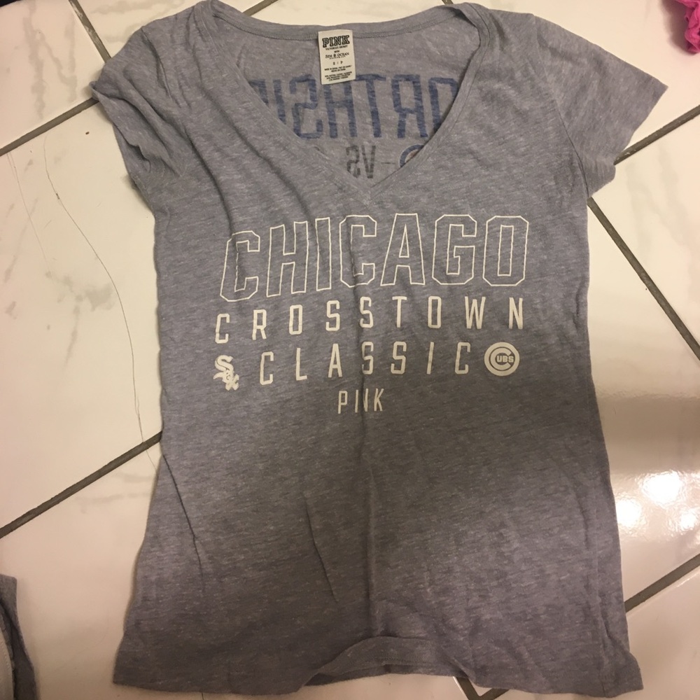 Pink. Size small. Grey tshirt.