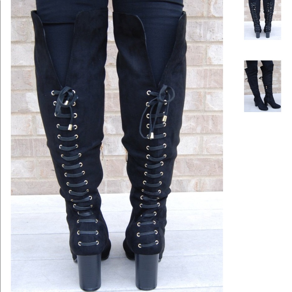 Knee high heeled boots. New with box!