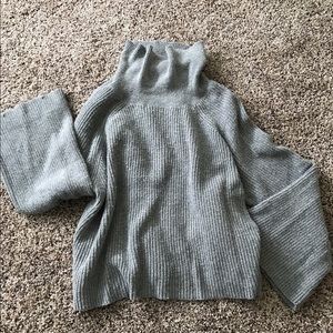 Wide armed turtle neck sweater