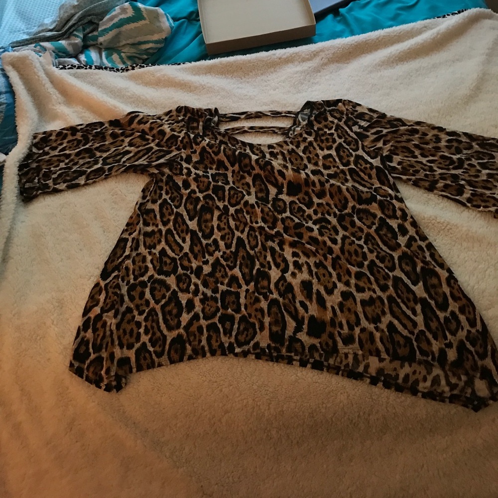 Leopard print silk stretch top.