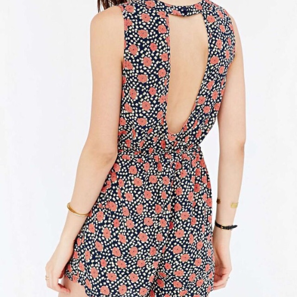 NWOT Urban Outfitters open back romper