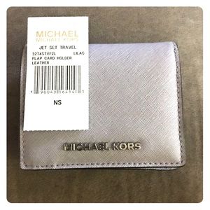 Authentic Michael Kors J/S flap card holder