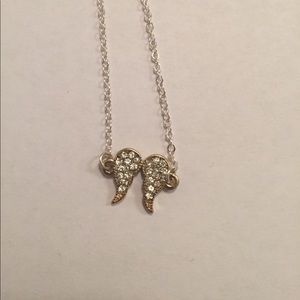 Angel wing necklace from Claire's