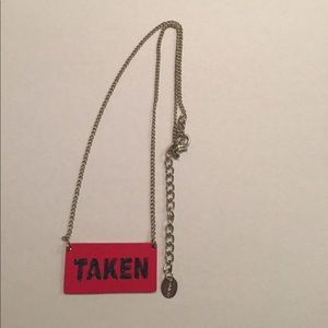 Single/Taken necklace from Claire's