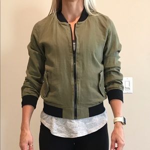 green canvas bomber jacket