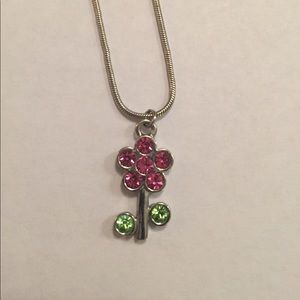 Silver flower charm necklace from Claire's