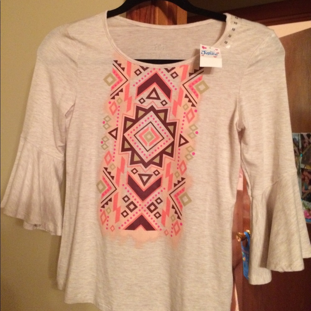 Justice long sleeve girls top. New with tag.