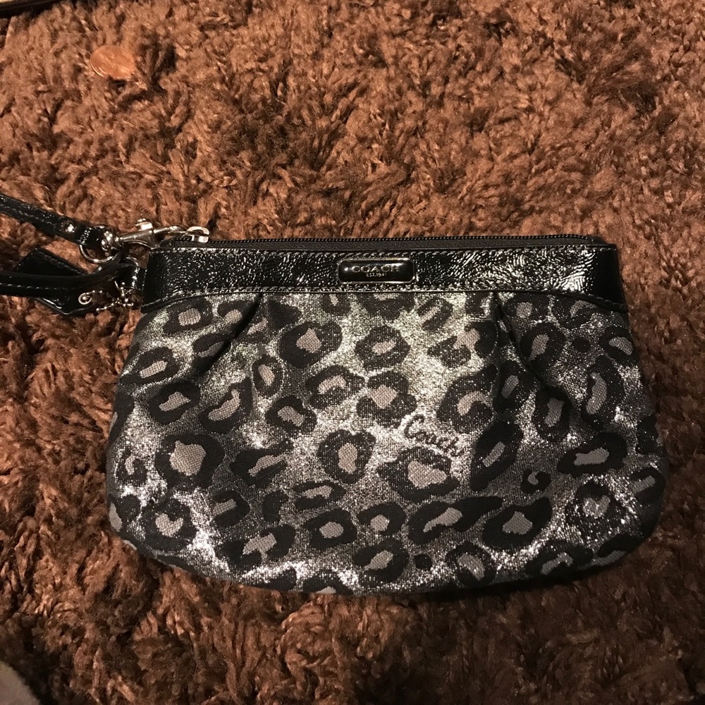 Coach black cheetah print wristlet