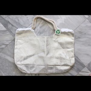 White metallic beach bag.