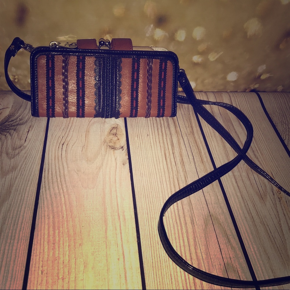 Brown cross body clutch