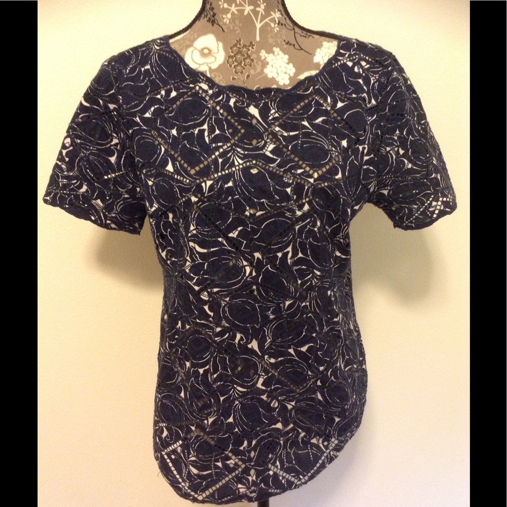 Navy floral eyelet blouse with scalloped edging