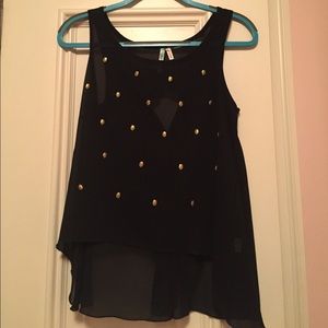 Semi-sheer black top with gold skull detailing