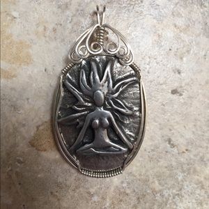 Wire embellished pendent