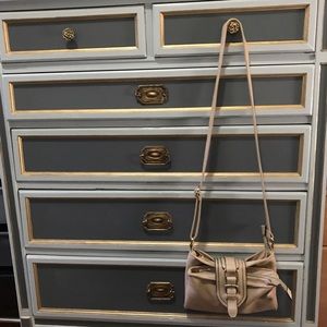 Tan colored mini purse