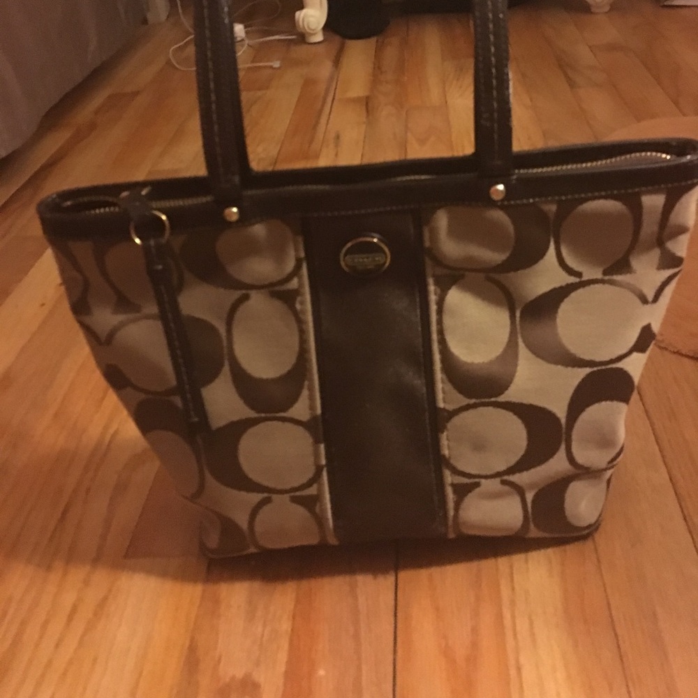 Brown and tan purse🌻