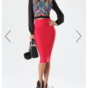 Bright coral Bebe midi pencil skirt.