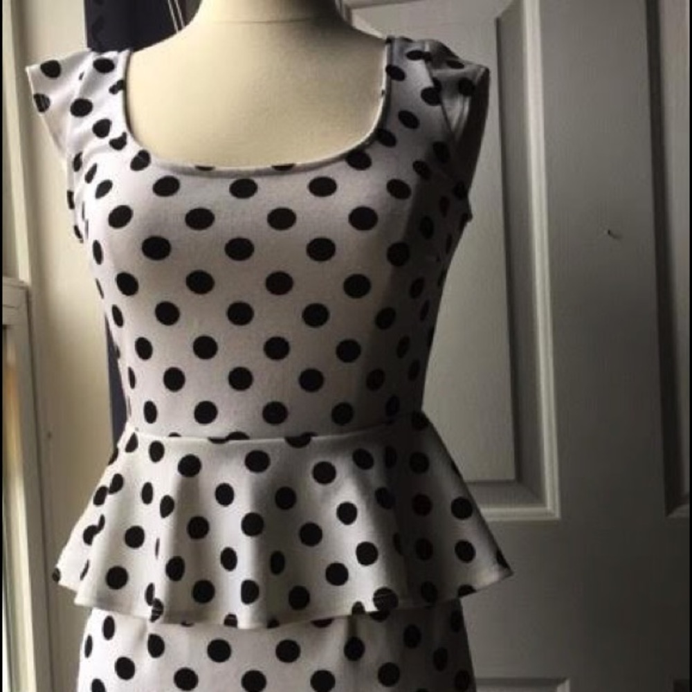 Polka dot bodycon dress with peplum detail