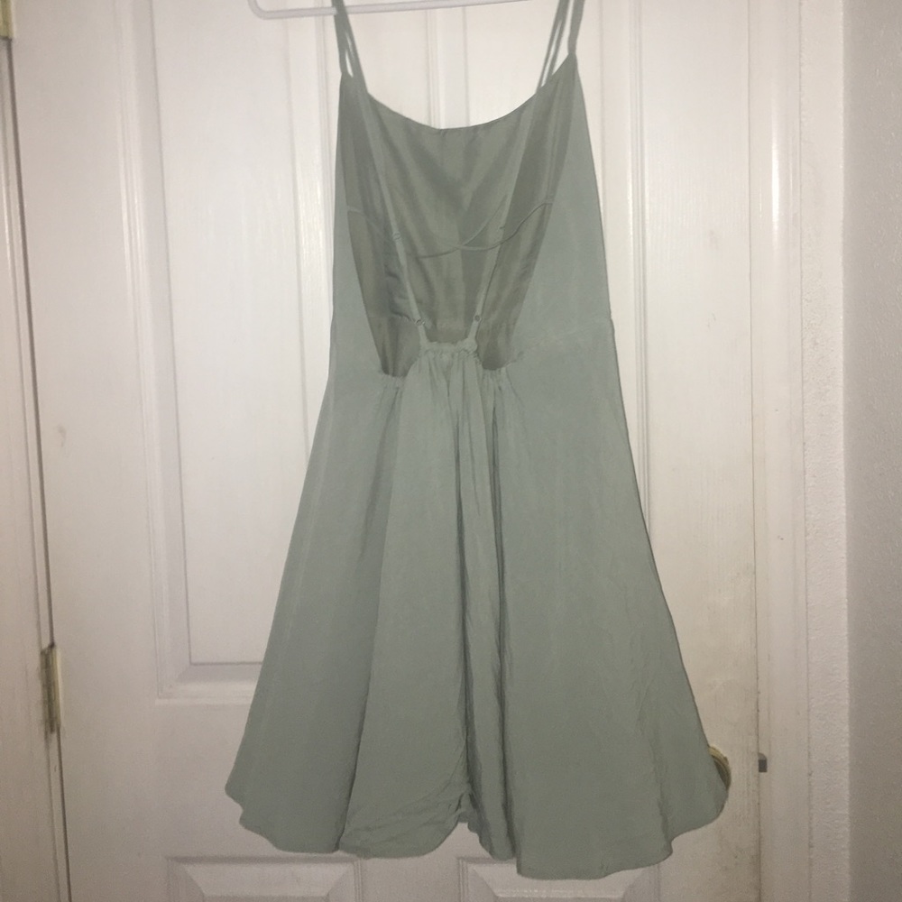 mint green dress, short, and low back
