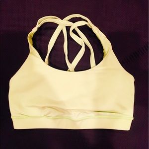 Neon yellow Lululemon sports bra