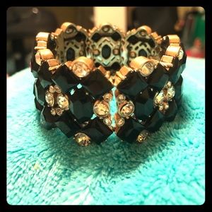 ELASTIC COSTUME JEWELRY BRACELET BLACK AND GOLD