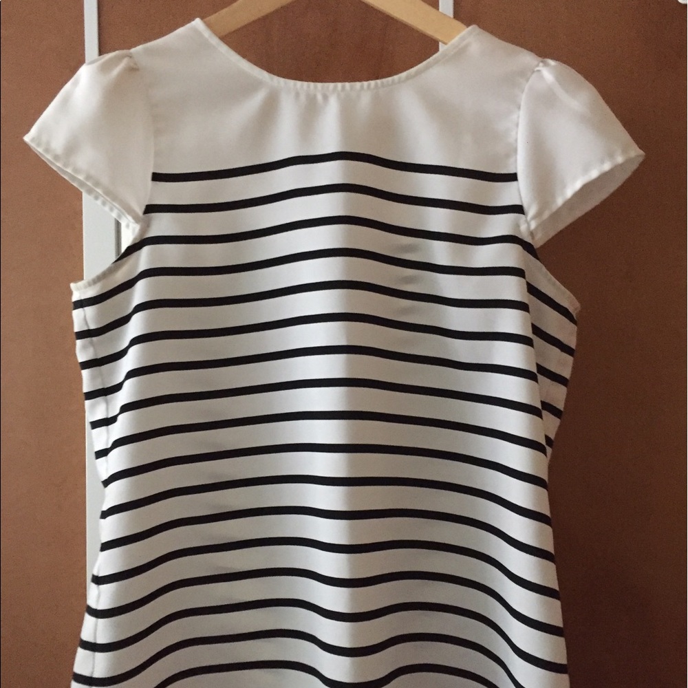 Black and white stripped blouse.