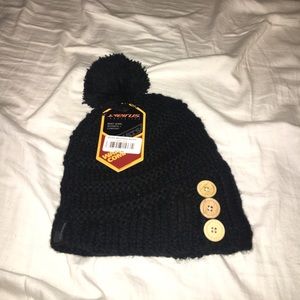 Winter hat, never worn, still has tags