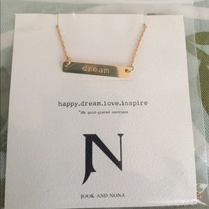 Jook and Nona gold plated Dream necklace.