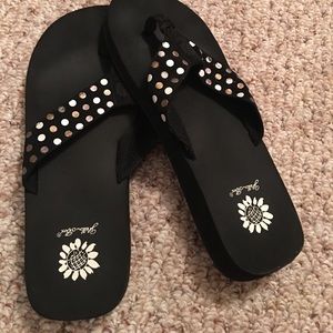 Yellow box flip flops