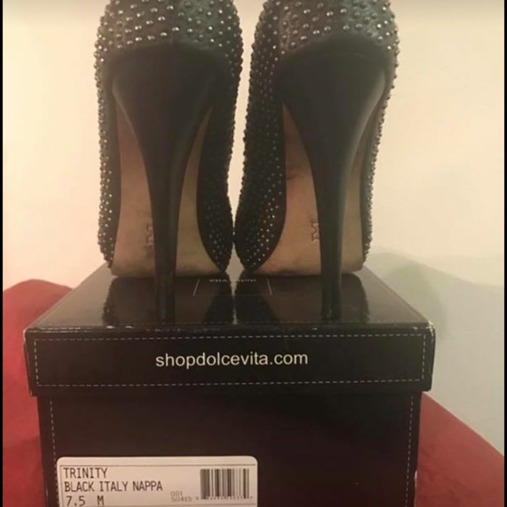 New black with silver studded pumps.
