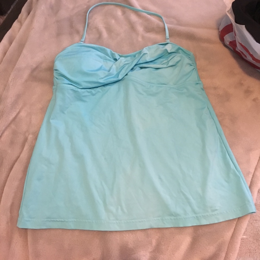 Women's blue swim top and black swim trunks
