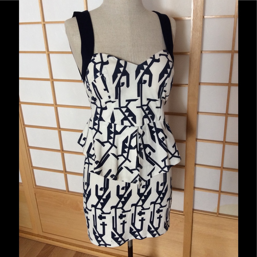 Paradisco Peplum Back Detail Dress from Australia