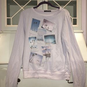 Wild fox sweater with beachy Polaroids on front